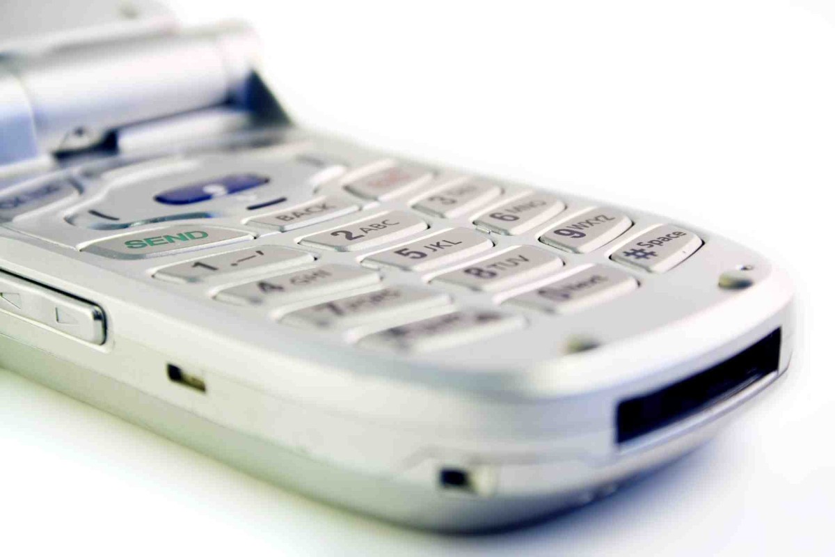 Close-up of a cordless phone keypad with number buttons and a “Send” key