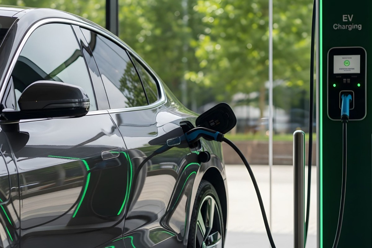 An electric car connected to a charging station