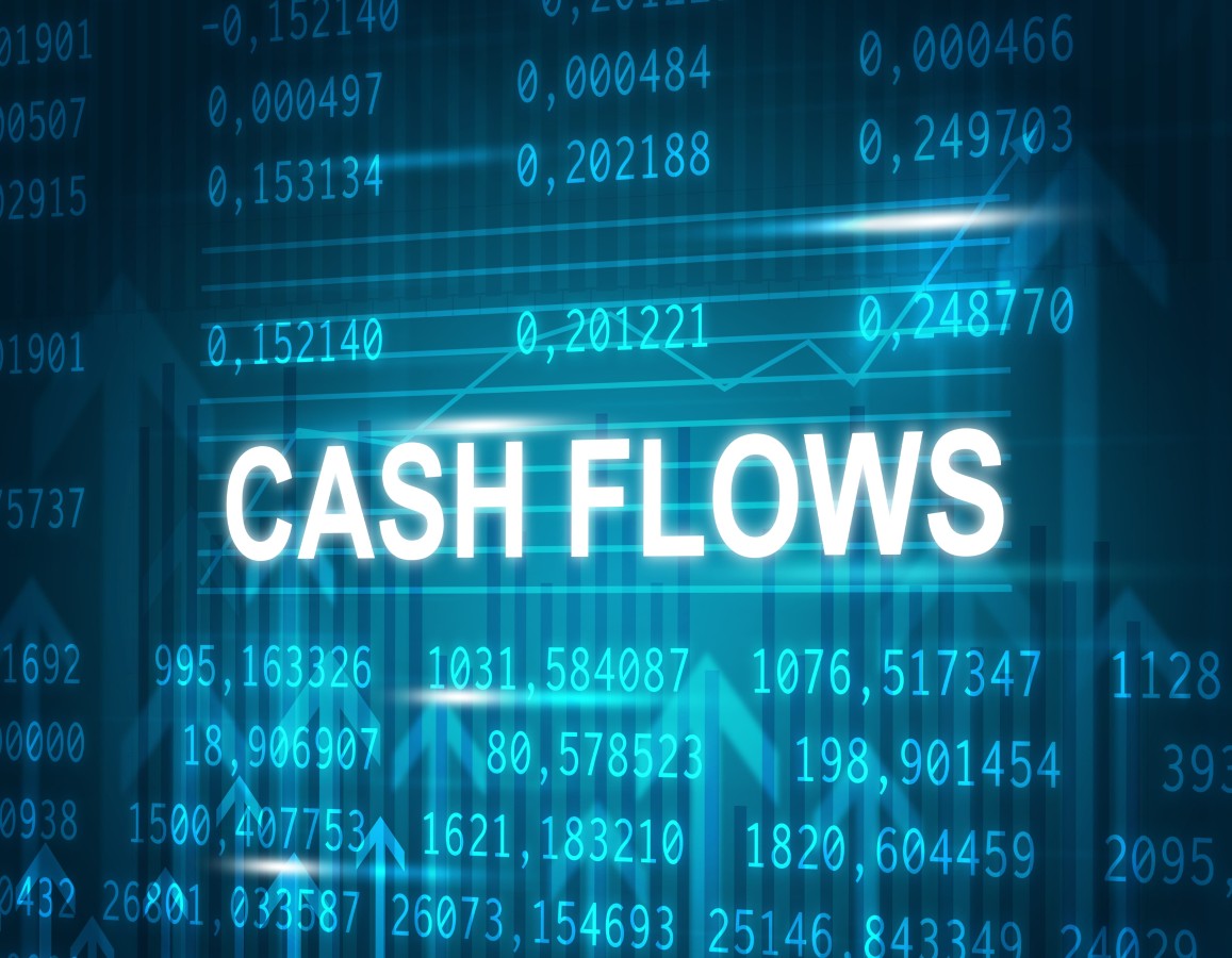 Cash flows text over financial charts and numbers in a blue digital background