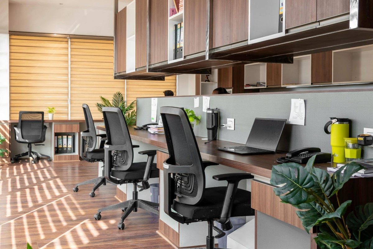Modern Office Interior with Desks and Plants